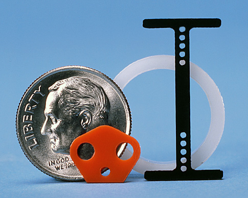 Precision laser cut gasket - dime for scale